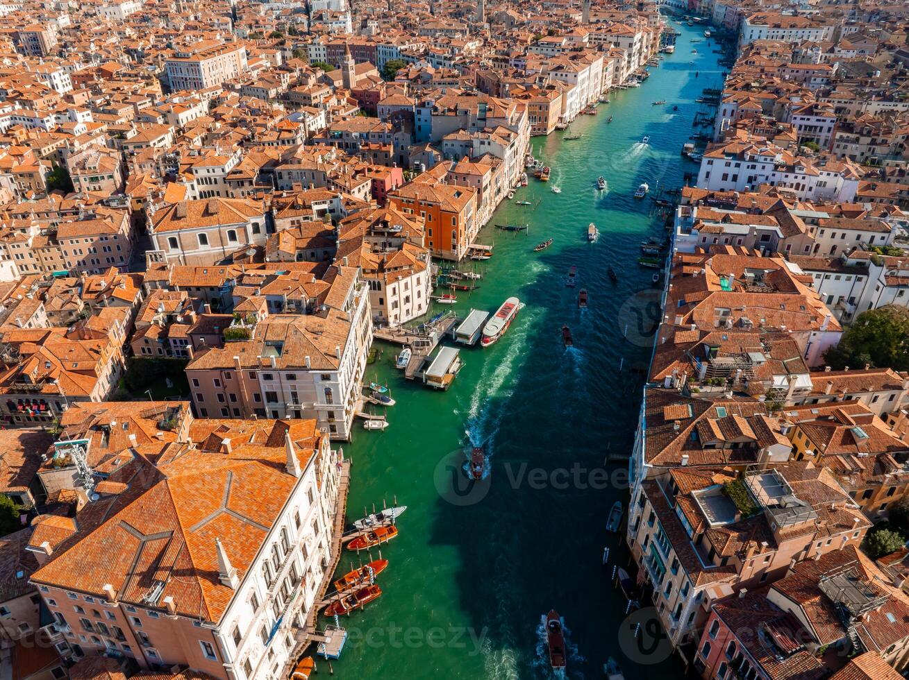 Aerial View of Venice near Saint Mark's Square, Rialto bridge and narrow canals. photo
