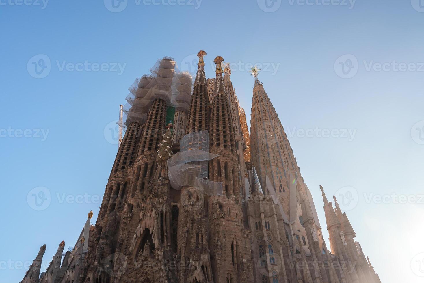 Sagrada Familia Basilica Spires Against Blue Sky, Barcelona, Spain photo