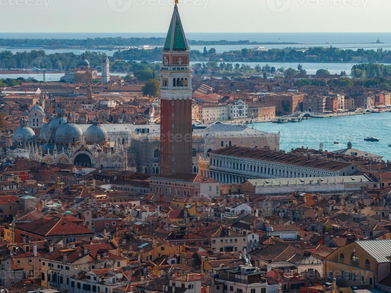 Aerial View of Venice near Saint Mark's Square, Rialto bridge and narrow canals. photo