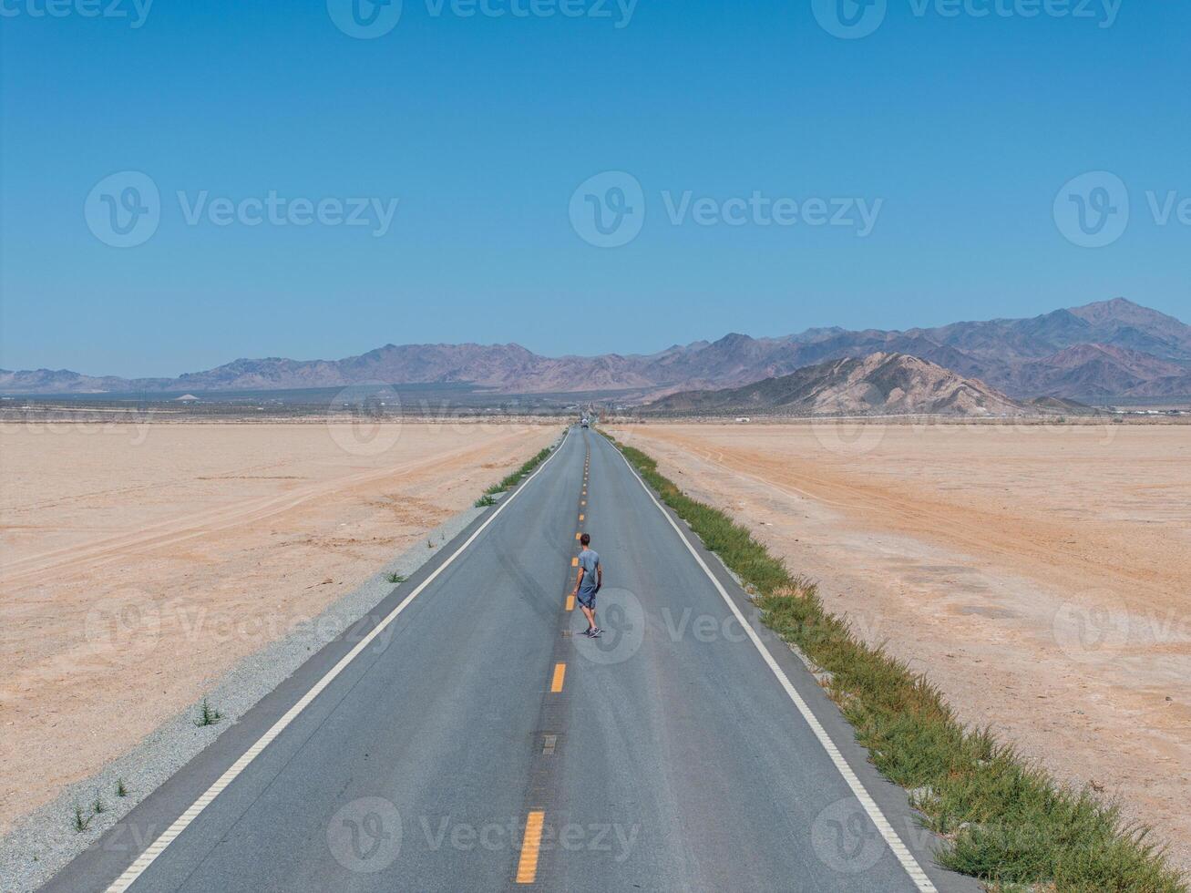 Classic panorama view of an endless straight road photo