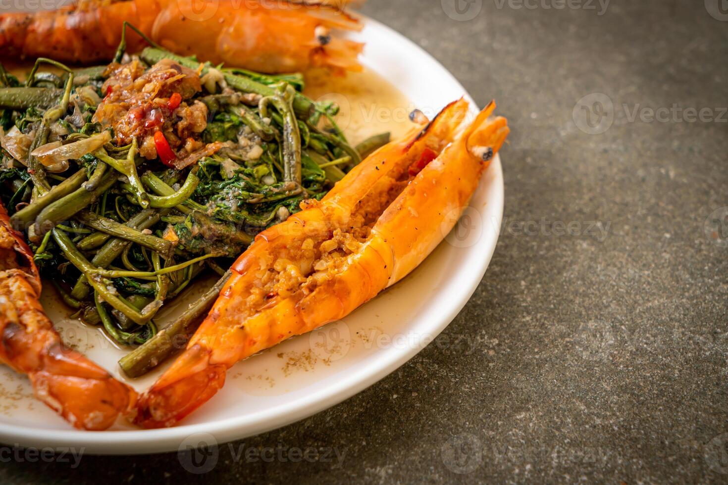 Stir-fried water mimosa with river prawns photo