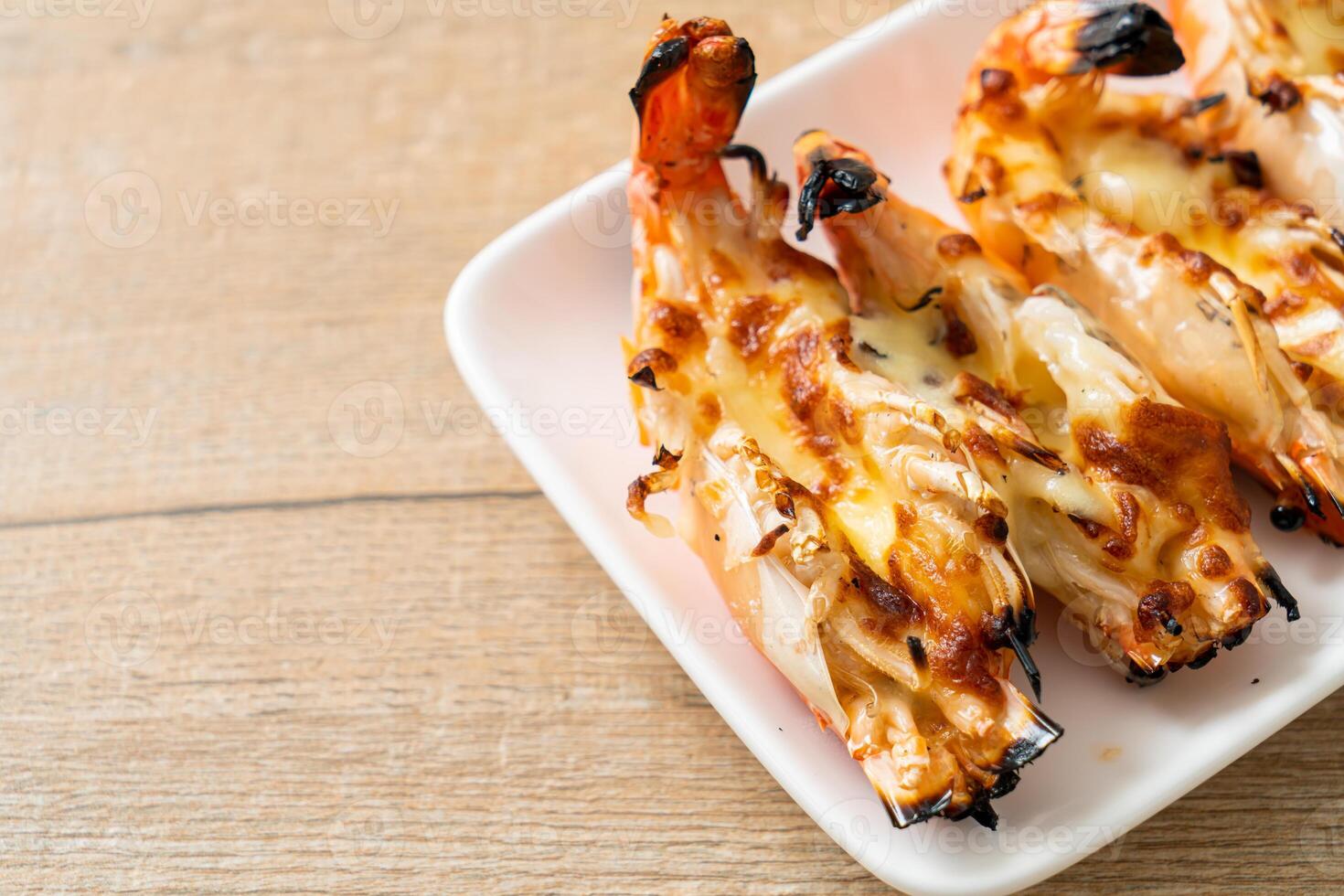 grilled river prawns or shrimps with cheese photo