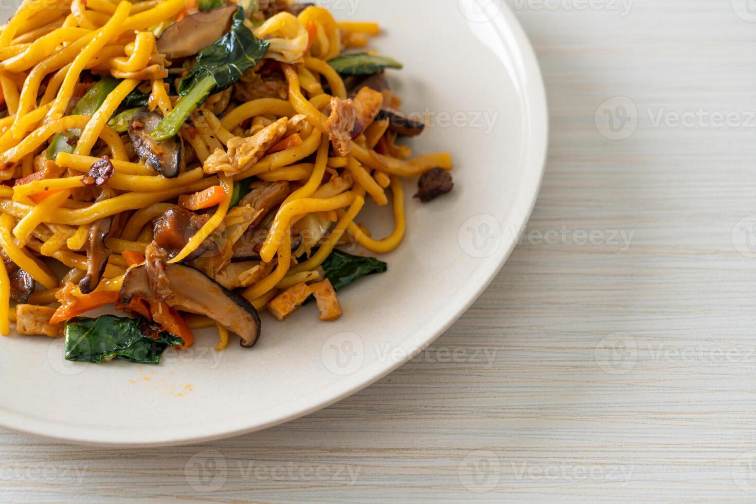 stir-fried yakisoba noodles with vegetable in vegan style photo