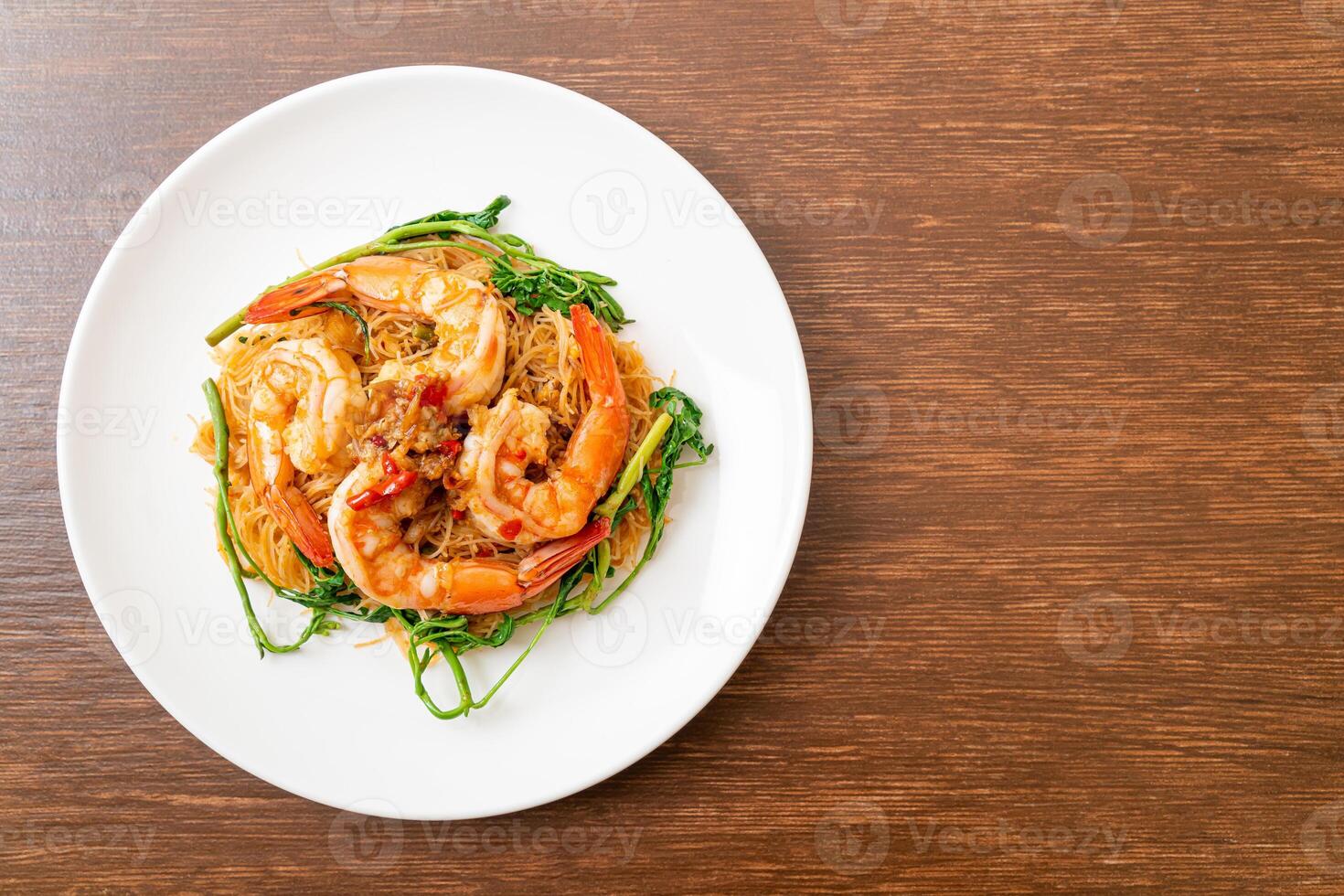 Stir-fried rice vermicelli and water mimosa with shrimps photo