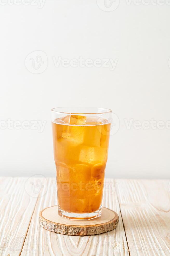 Delicious sweet drink tamarind juice and ice cube photo