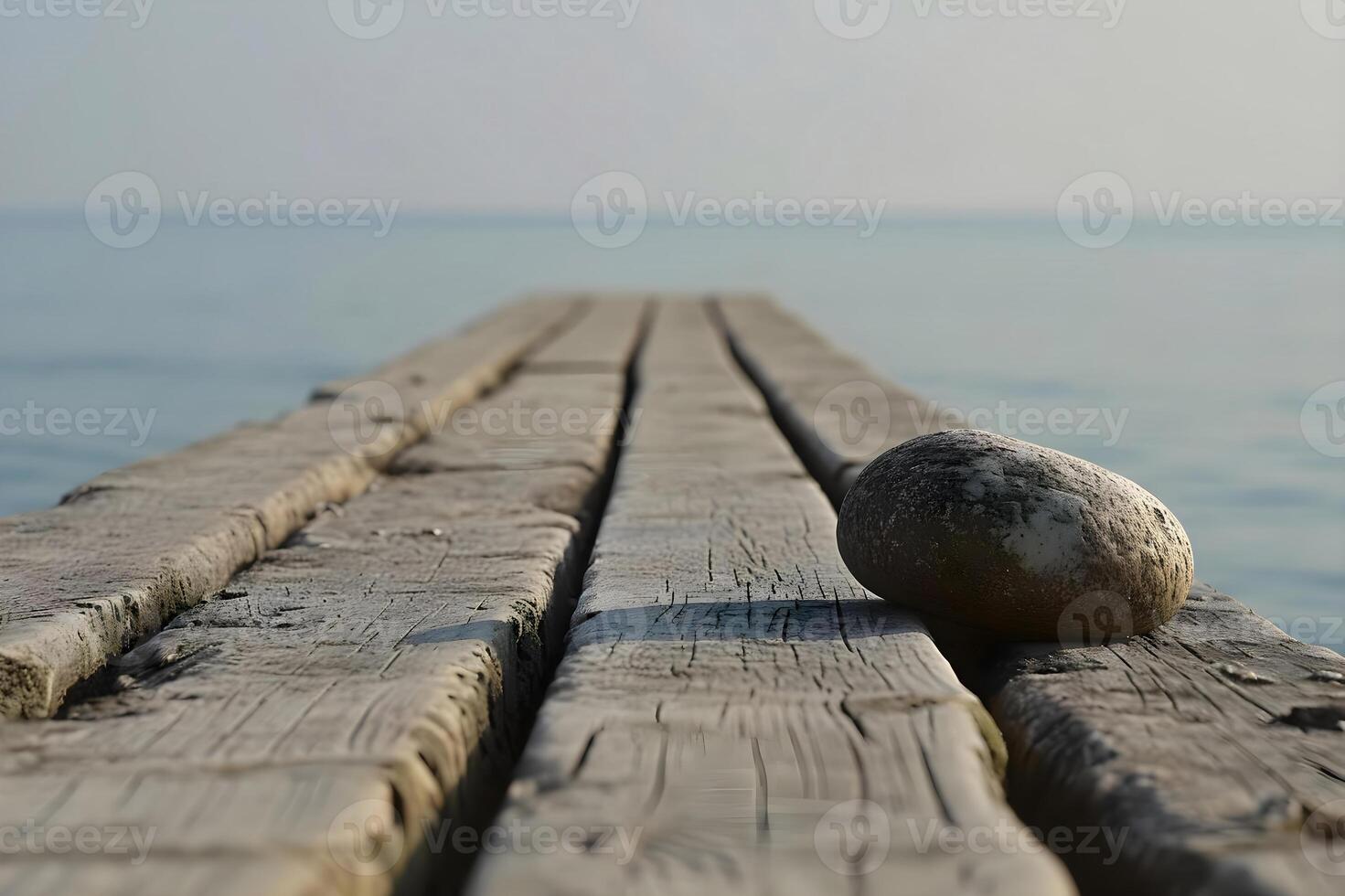 ai generado un Roca sentado en parte superior de un de madera muelle foto