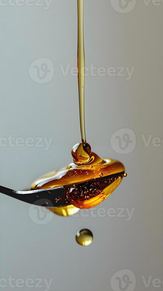 AI generated a drop of liquid is being dropped from a spoon photo
