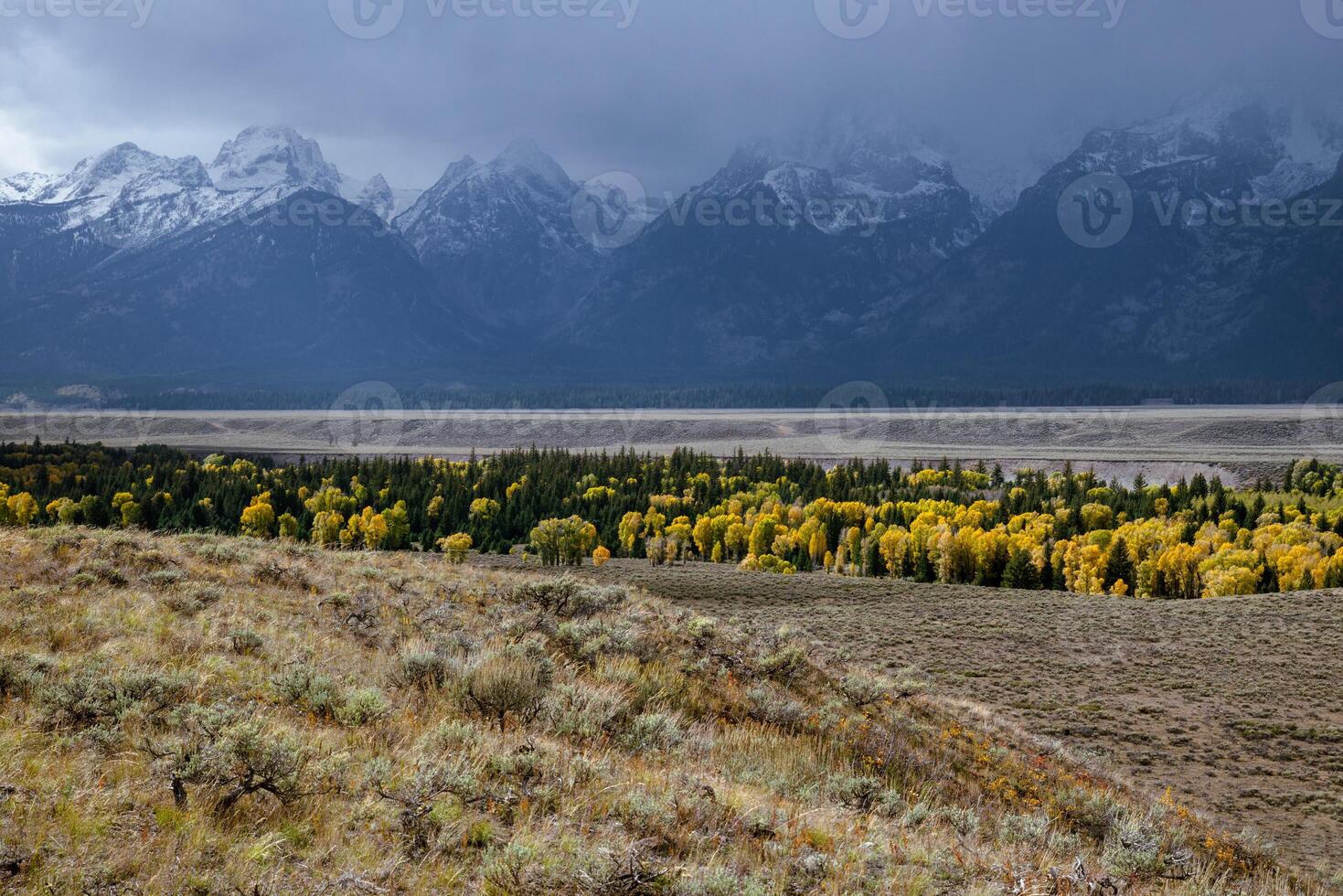 Stormy weather over the Grand Teton mountain range photo