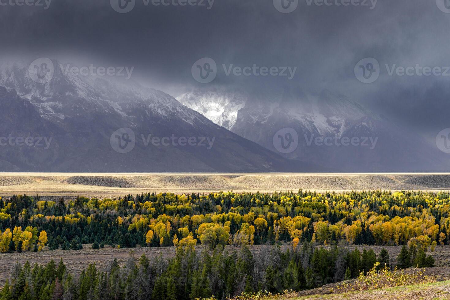 Stormy weather over the Grand Teton mountain range photo