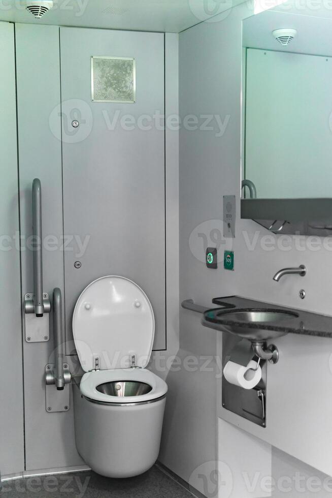 toilet interior in commuter train car photo