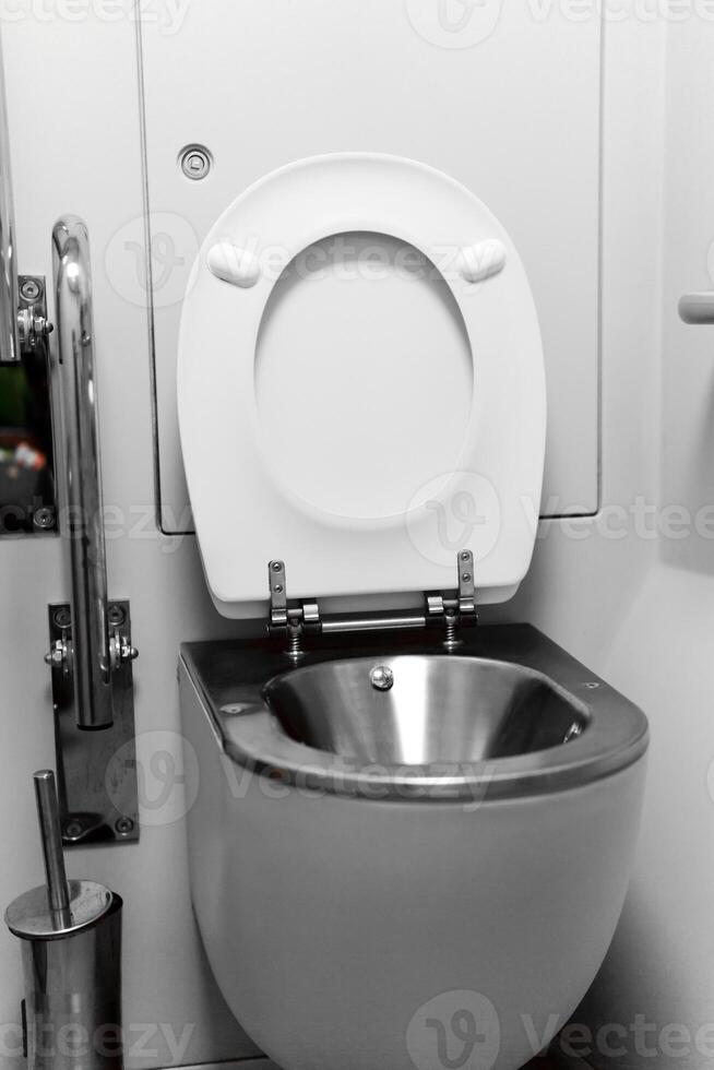 vacuum toilet in a passenger train carriage photo
