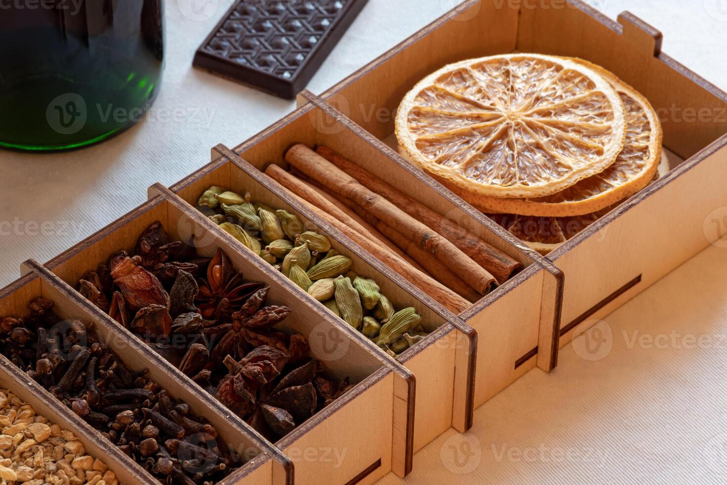 set of spices for mulled wine in a wooden box photo