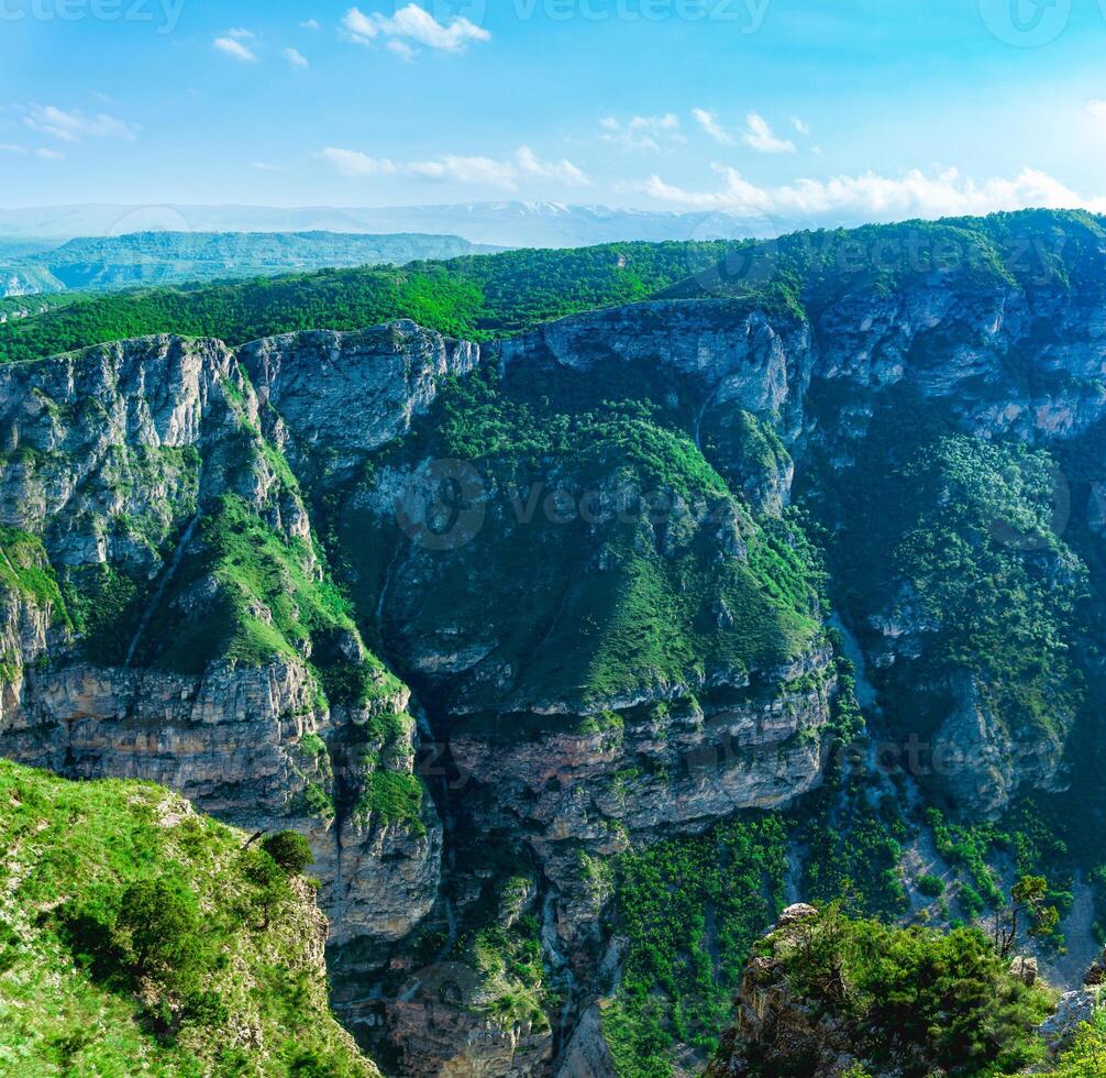 mountain landscape in the Caucasus with rocky cliffs on the slopes of the huge canyon of the Sulak River photo