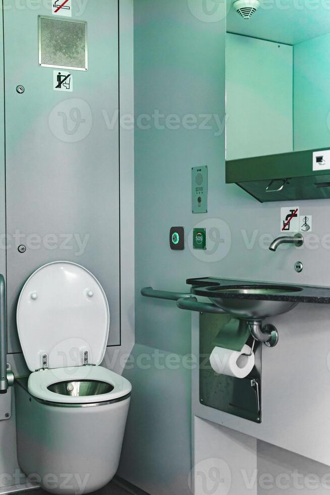 toilet interior in commuter train car photo