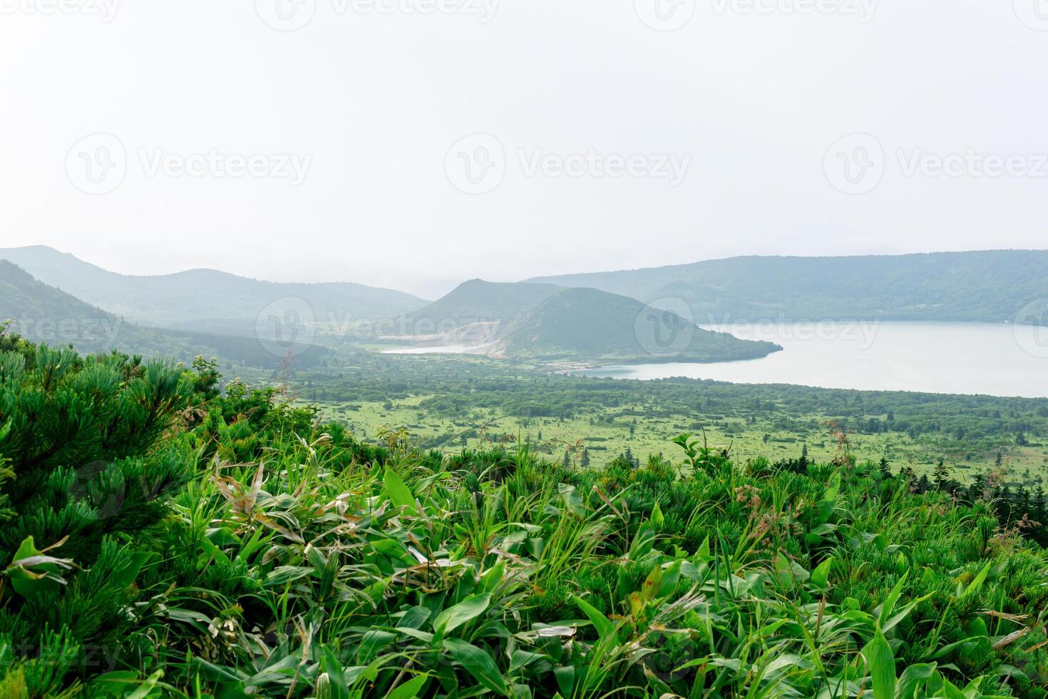natural landscape of Kunashir island, view of the Golovnin volcano caldera with hot lakes photo