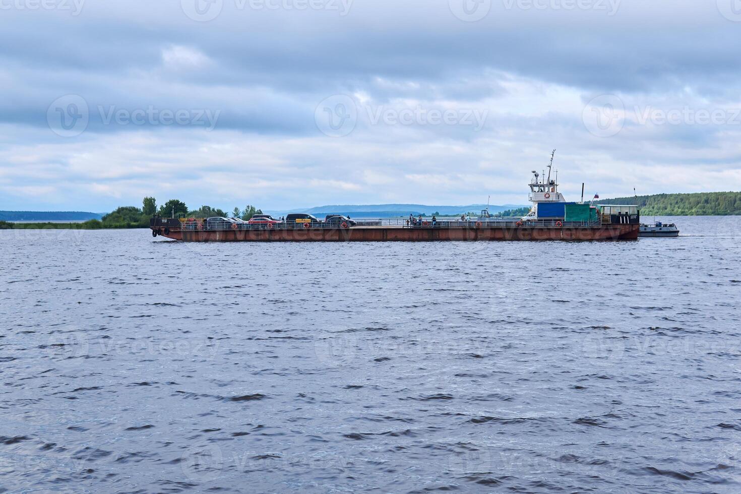 ferry crossing on the Kama river, Russia photo