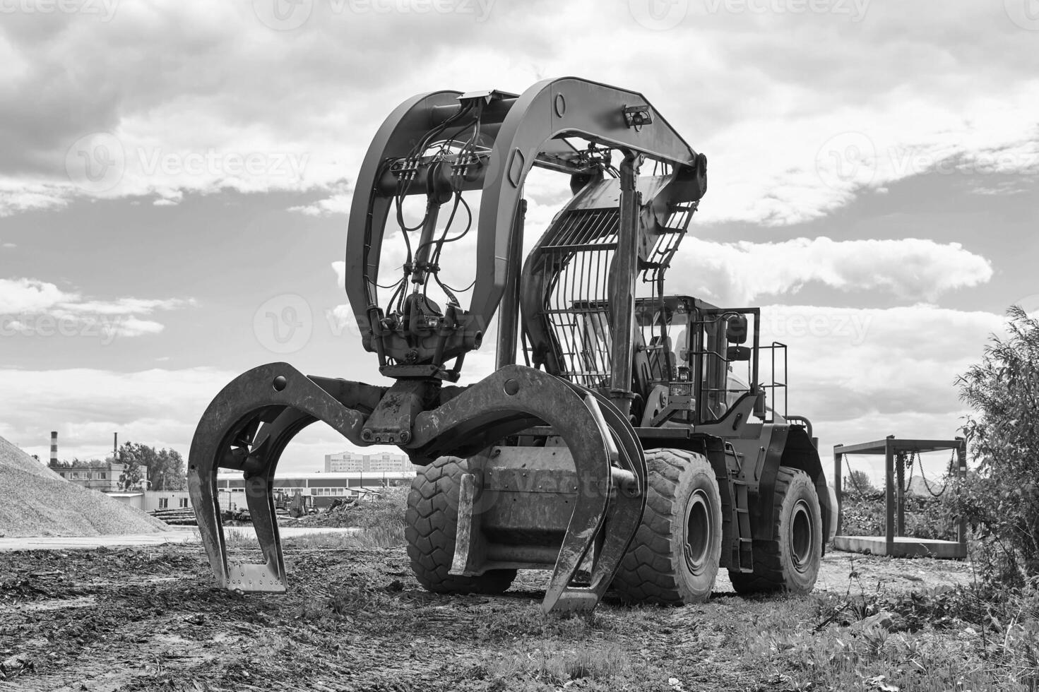 indusrtial dual function grapple skidder outdoors photo