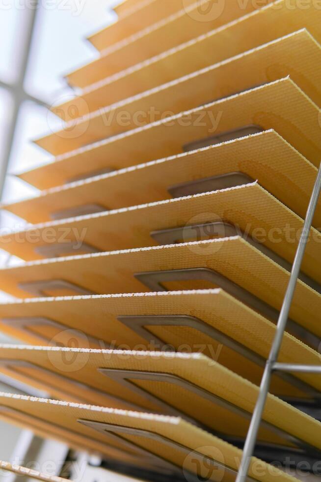 freshly baked wafer sheets move along the conveyor of a confectionery factory photo