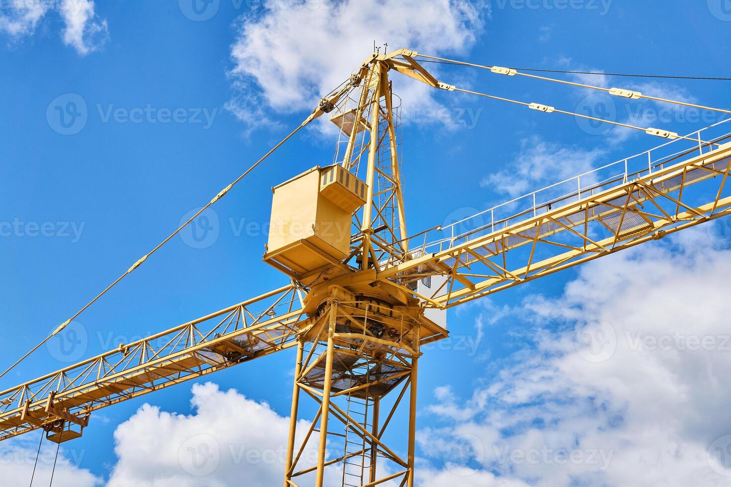 fragment of a construction tower crane against a sky
