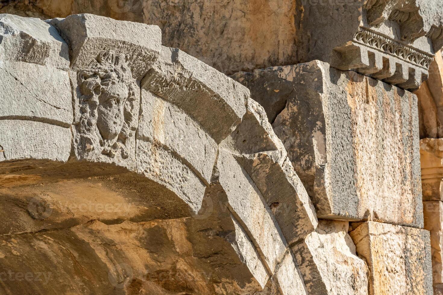 fragment of ruins of an ancient greek building antique amphitheater in Myra, now Demre, Turkey photo