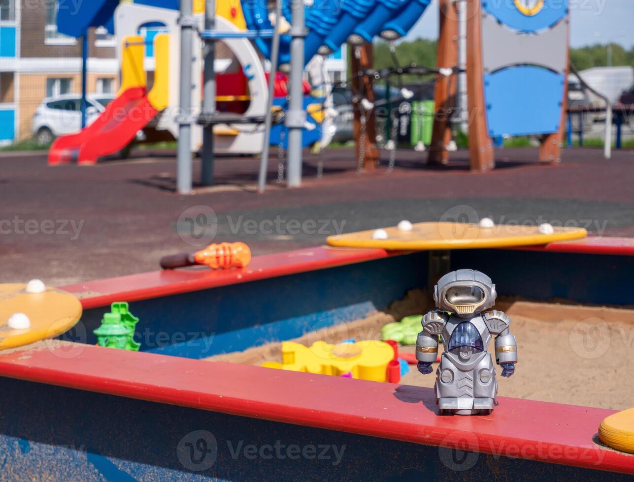 toys in the sandbox in the playground photo