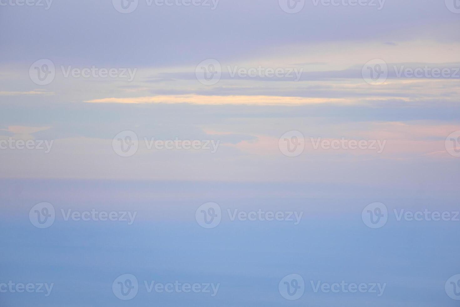 seascape - the sea merges with the sky in the dawn fog photo