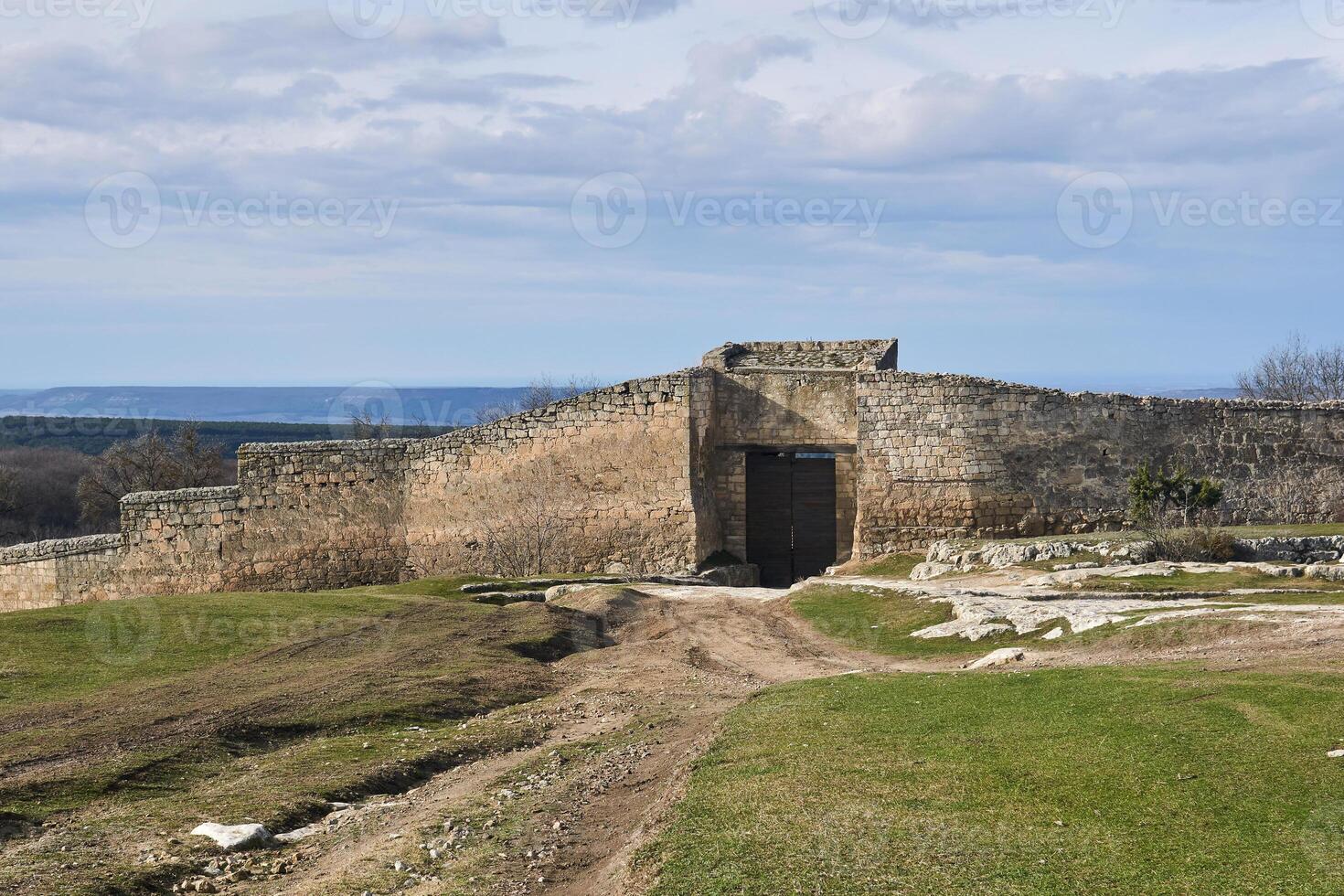 iron-clad gate to a medieval city-fortress Chufut-Kale, Crimea photo