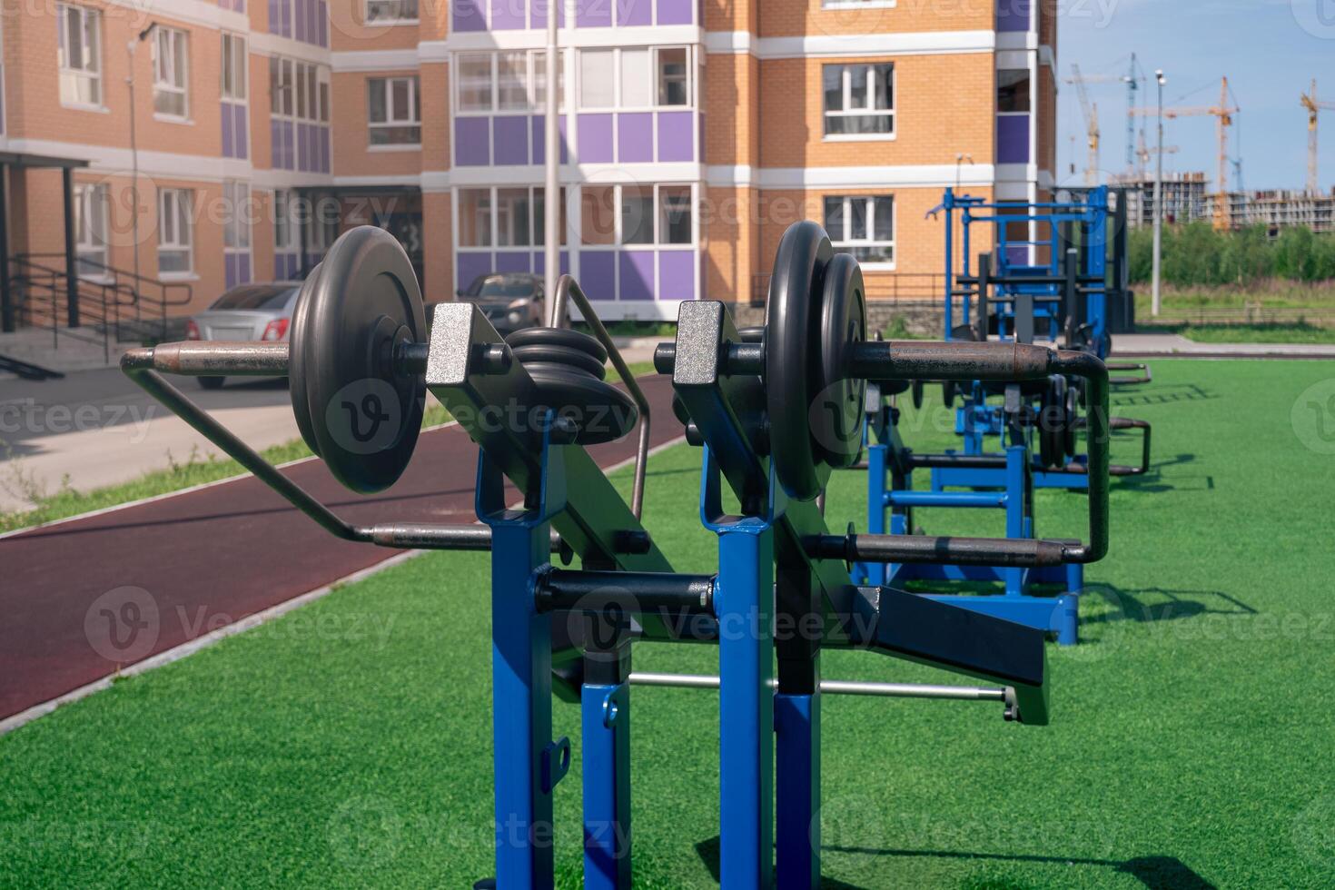 public exercise machines for outdoor weight training in the city courtyard photo