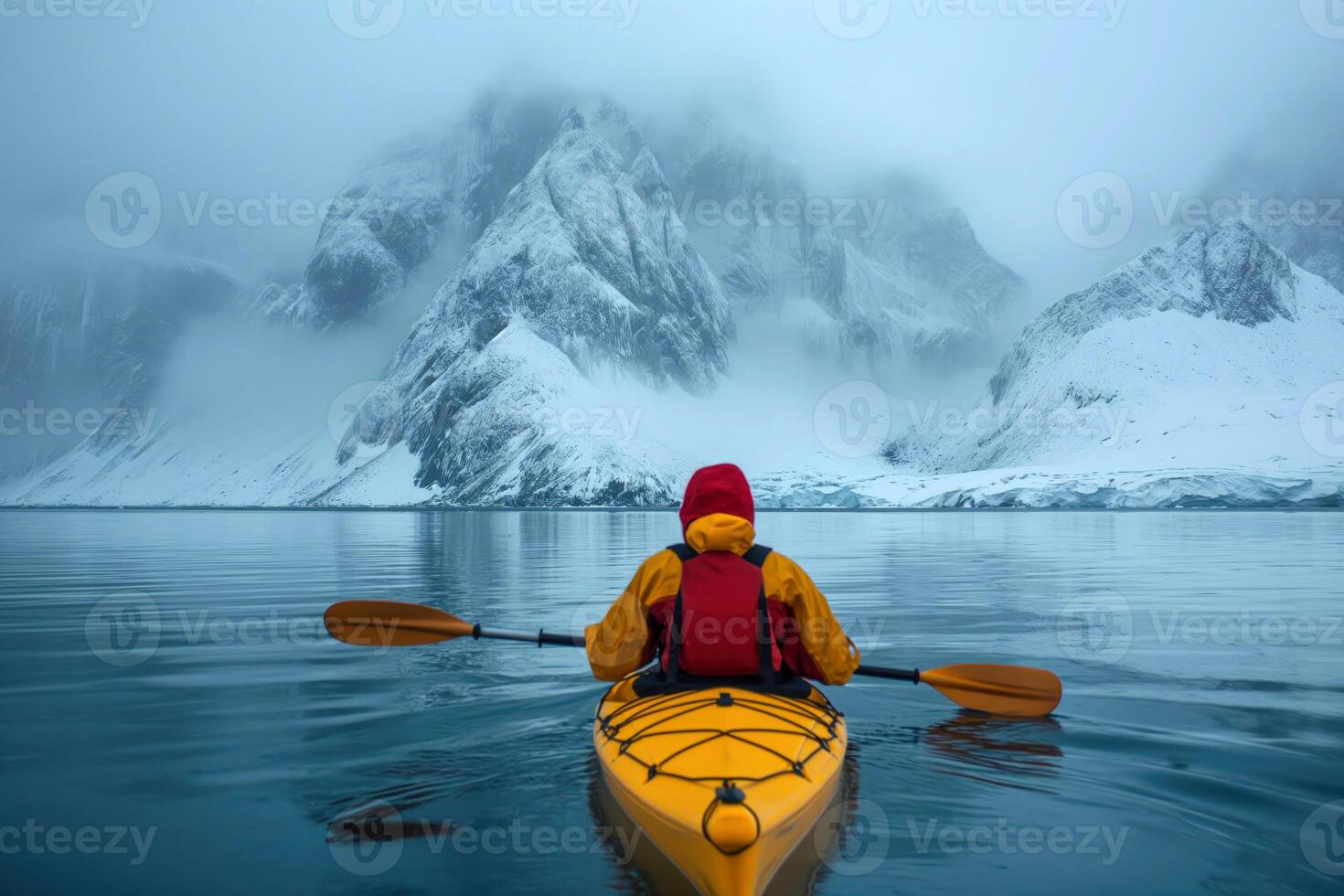 AI generated kayaker in a cold sea against the backdrop of frozen shores photo