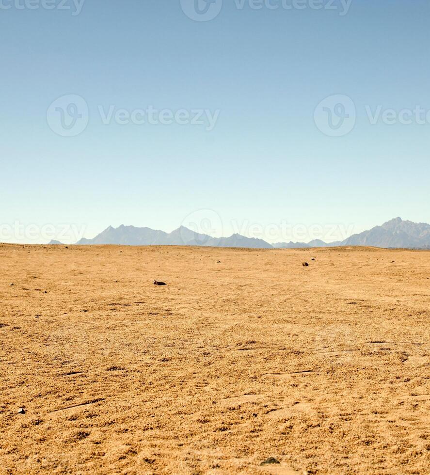 The beautiful Egyptian Sinai Peninsula with yellow sand, desert, plateaus and high and magnificent mountains, which is located on the borders with Palestine and Gaza, which contains the Suez Canal photo