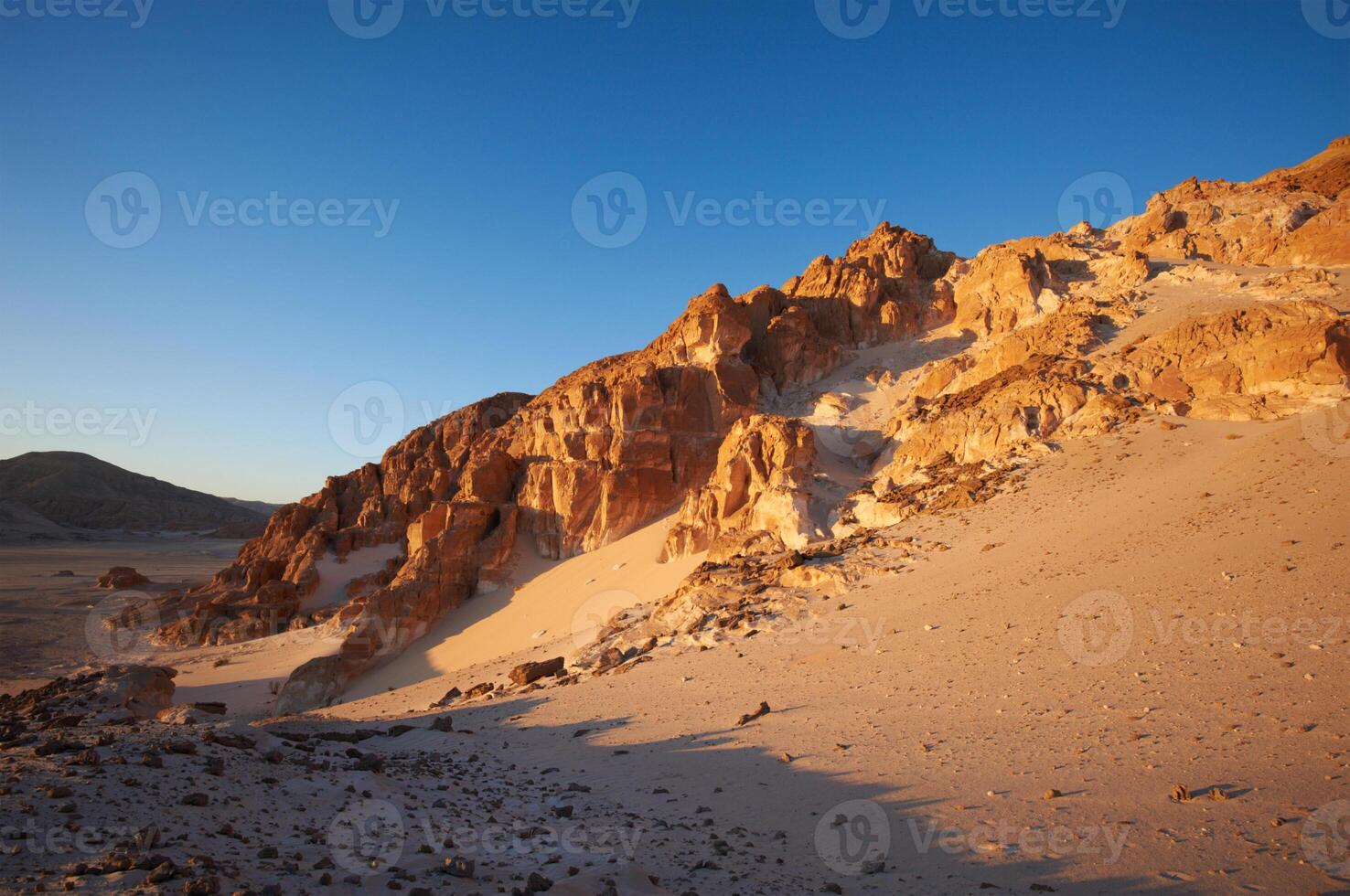 The beautiful Egyptian Sinai Peninsula with yellow sand, desert, plateaus and high and magnificent mountains, which is located on the borders with Palestine and Gaza, which contains the Suez Canal photo