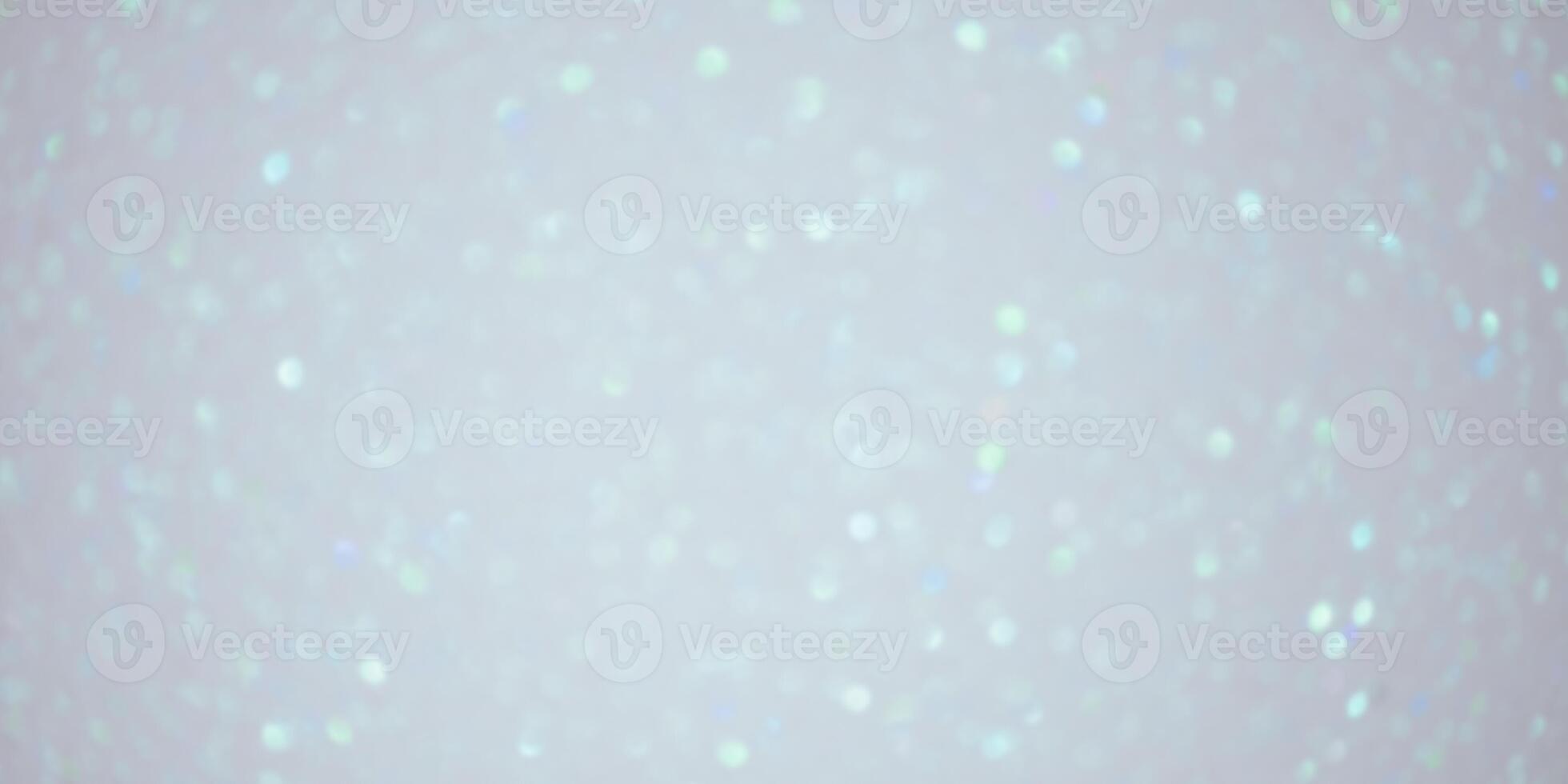 Sparkles defocus light. Glitter paper defocus as background. photo