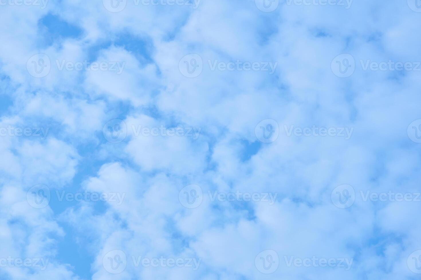 natural background - blue sky with light cumulus clouds photo