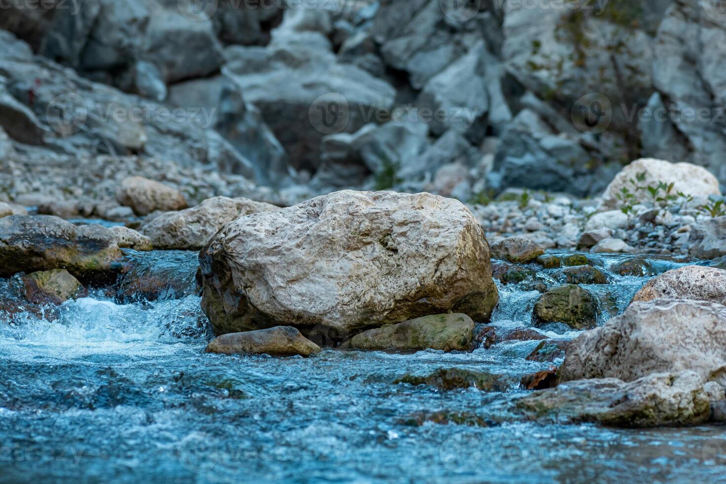 rocks in a mountain stream at the bottom of the canyon close-up photo