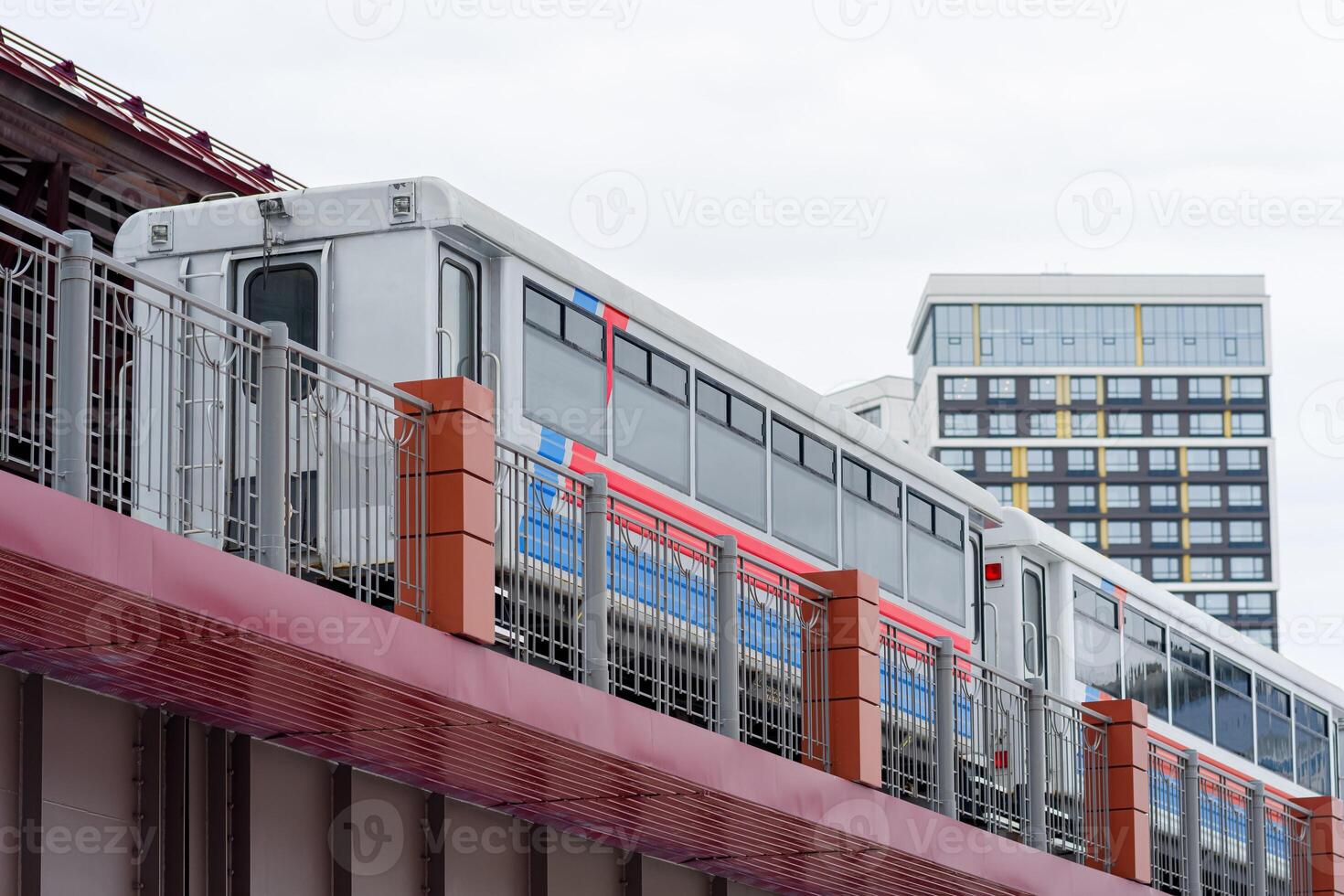 narrow-gauge railway passenger train at the station photo