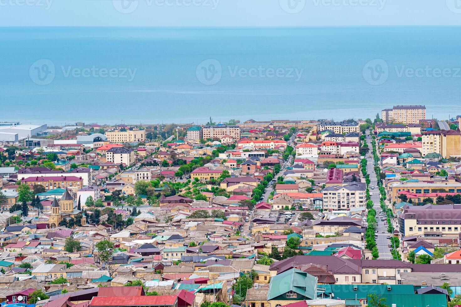 top view from the wall of the citadel to the city of Derbent and the Caspian Sea photo