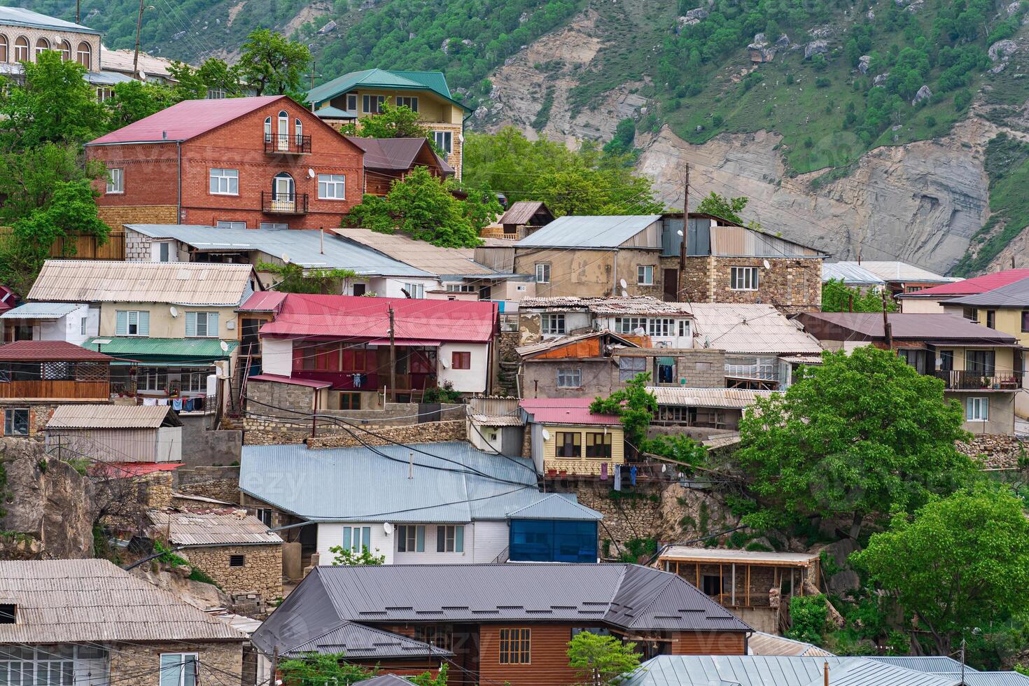 mountain village on a mountainside with houses over top of each other, Gunib in Dagestan photo