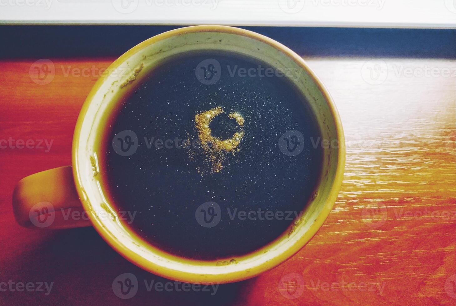 A cup of tea with cinnamon, the concept of space in a cup photo