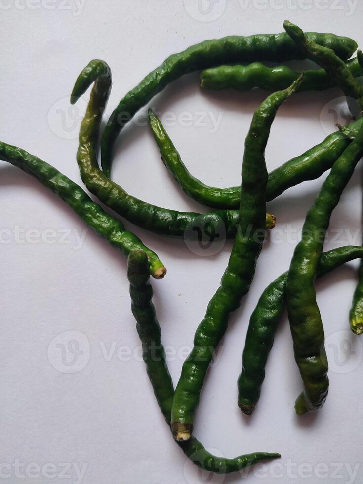 green chilies isolated on white background. Green chili with clipping path and full depth of field. Set or collection photo