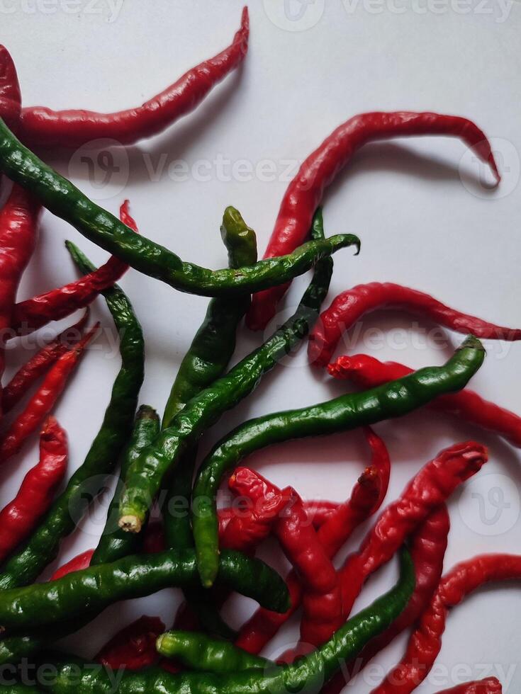 Natural spicy red and green chilies. Organic fresh chili peppers isolated on white. photo