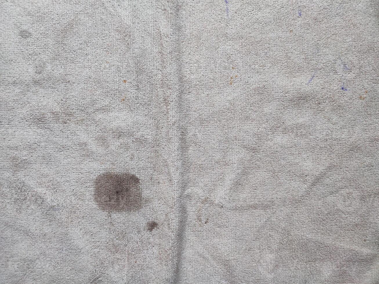 texture, pattern, background of dirty white towel exposed to sunlight photo