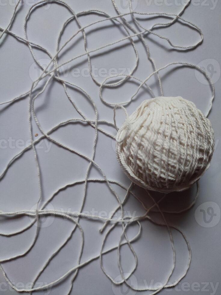 Realistic white merino wool fabric isolated on white photo