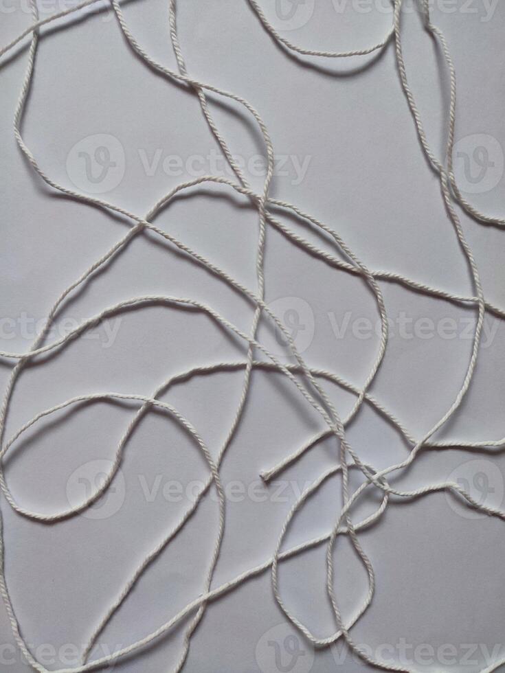Realistic white merino wool fabric isolated on white photo