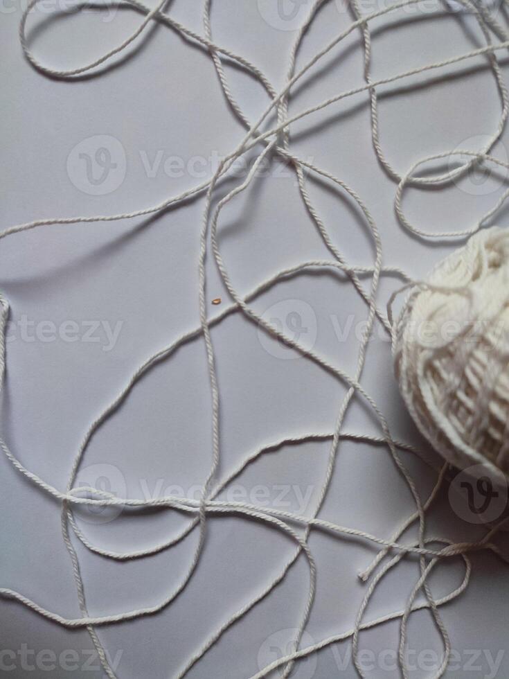 Realistic white merino wool fabric isolated on white photo