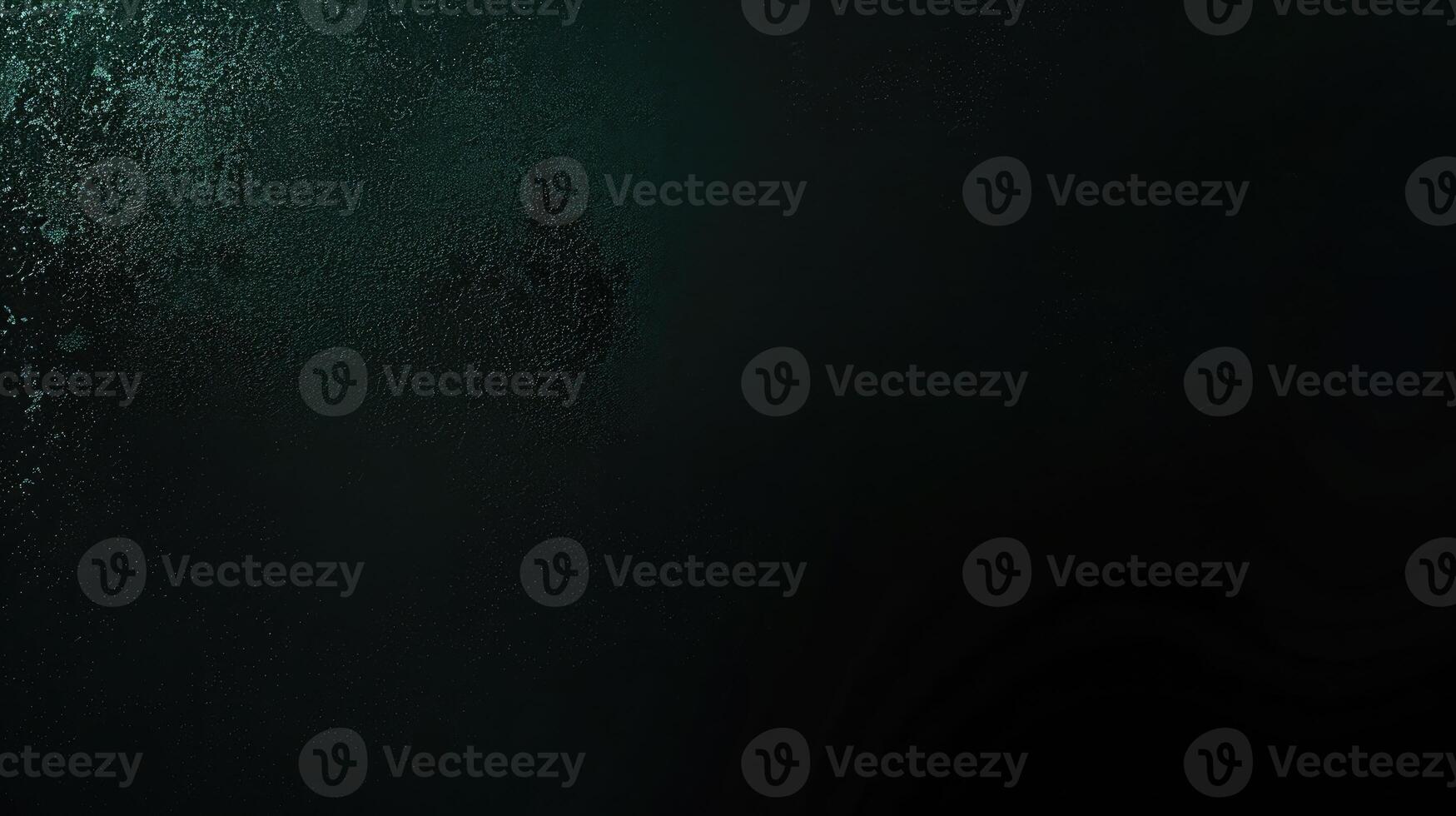AI generated Dark green color gradient grainy background, illuminated spot on black, noise texture effect, wide banner size. photo