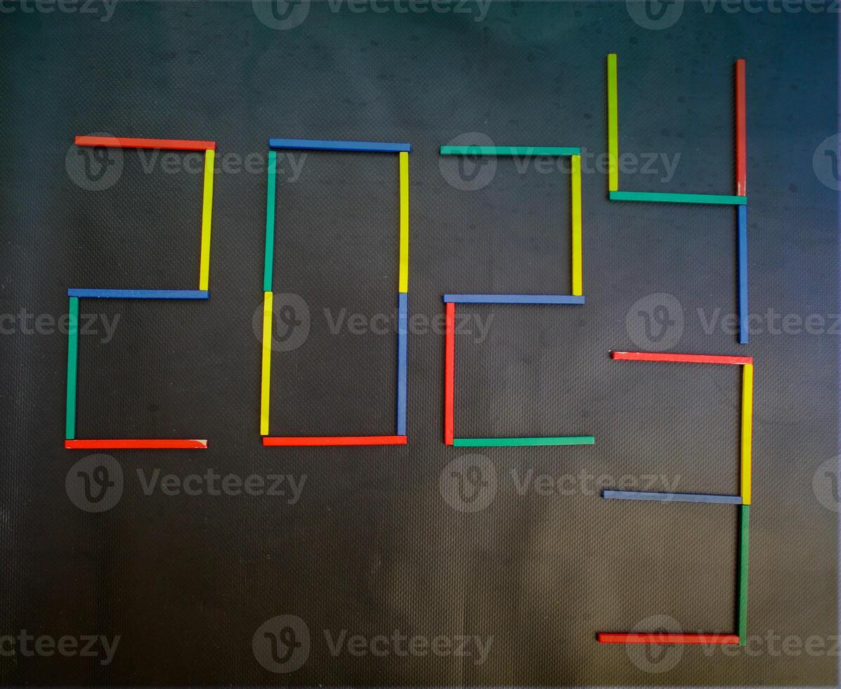 Happy New Year 2024 Idea. Transition from 2023 to new year 2024 concept with text on wooden blocks. Creative Concept. photo