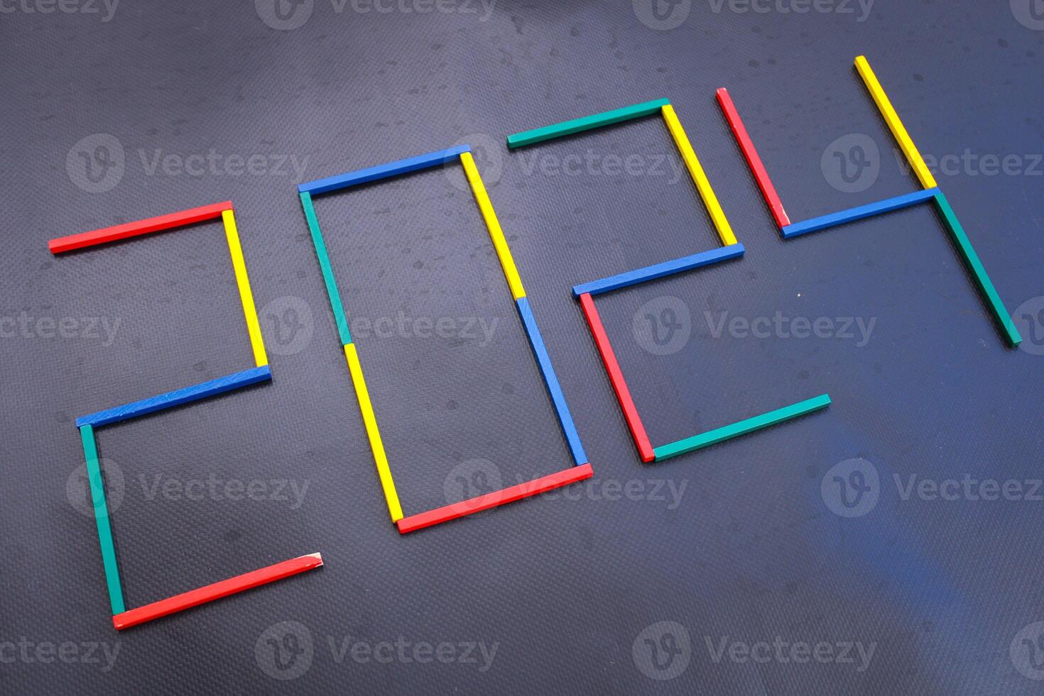 Happy New Year 2024 Idea. Transition from 2023 to new year 2024 concept with text on wooden blocks. Creative Concept. photo
