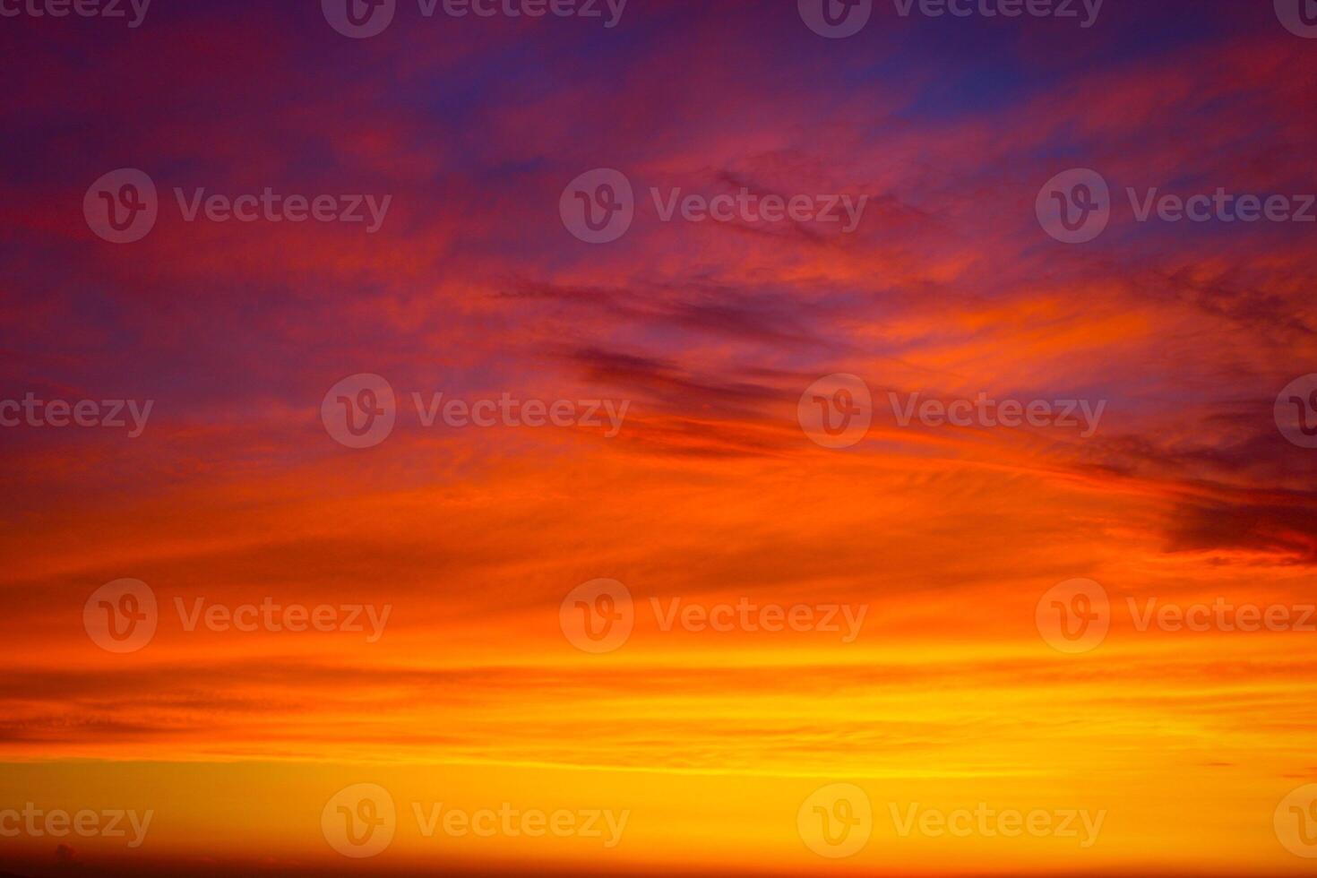 Clouds and different color tones in the sky at sunset. Dance of colors in the sky. Amazing and incredible sunset. photo