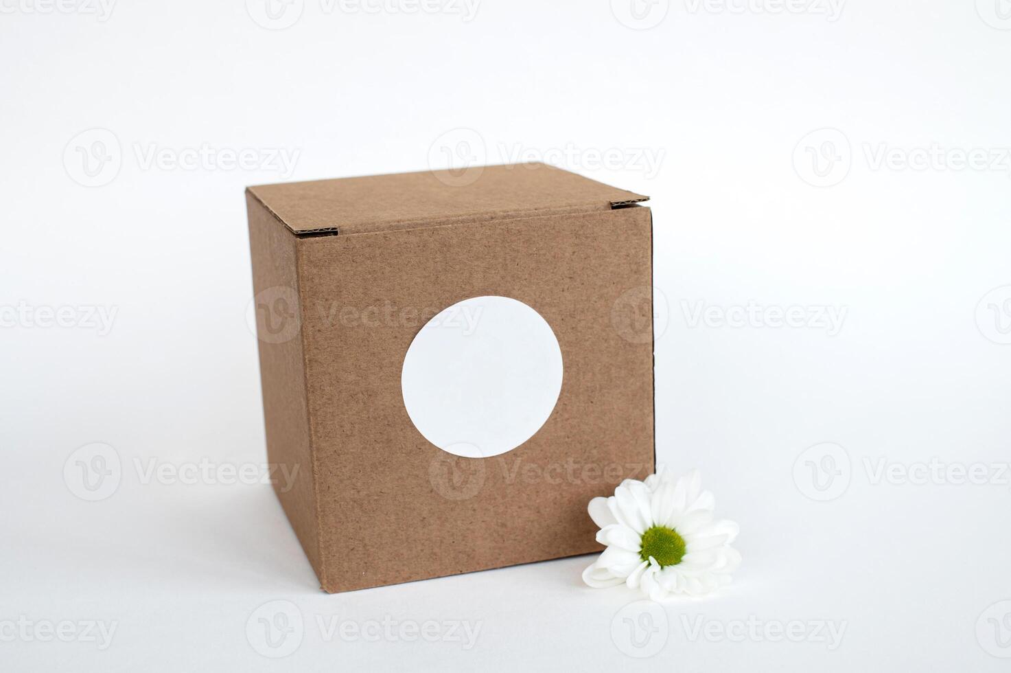 Round sticker mockup on gift box, tech box and blank sticker, adhesive label, white flower photo