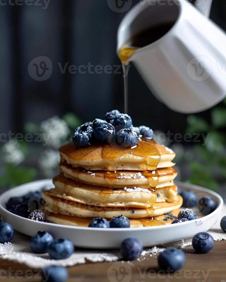 AI generated Gluten free vegan blueberry pancakes, blueberries on top of pancakes and around, The cup is watering the pancakes from above photo